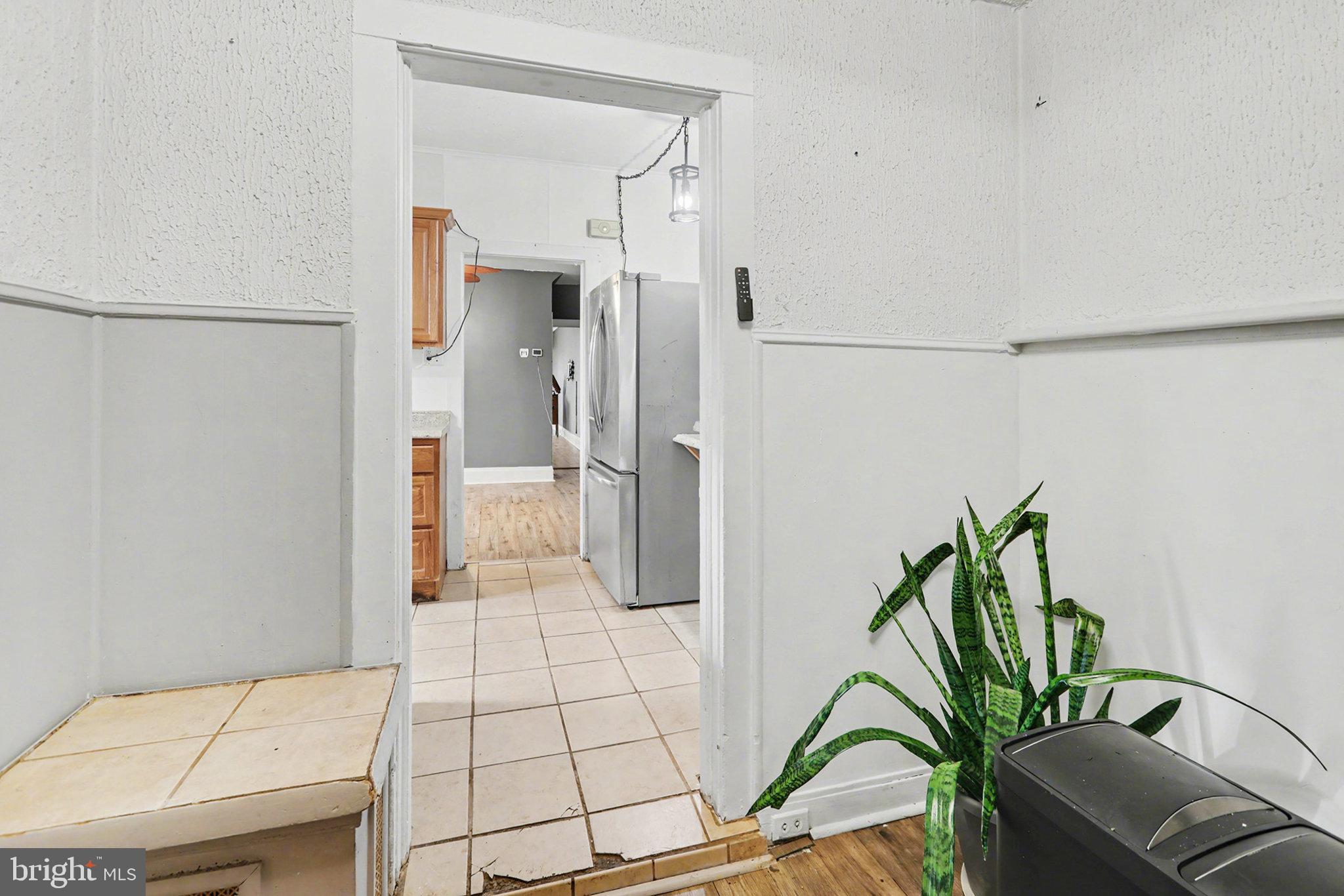 2721 Butler Street Harrisburg, PA 17103 - Photo 14 of 32 Inviting entryway to a cozy kitchen space.