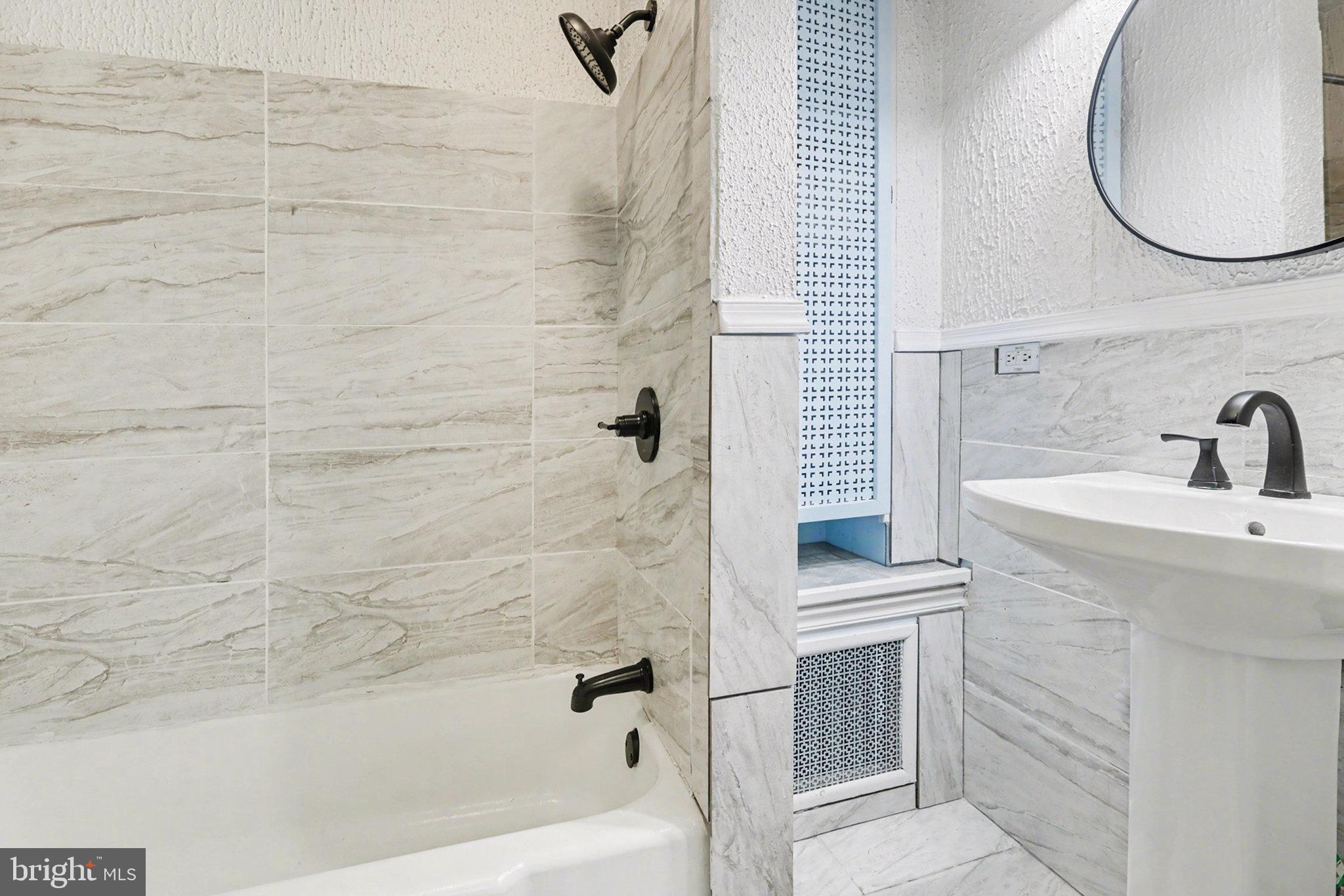 2721 Butler Street Harrisburg, PA 17103 - Photo 15 of 32 Sleek bathroom with modern finishes.