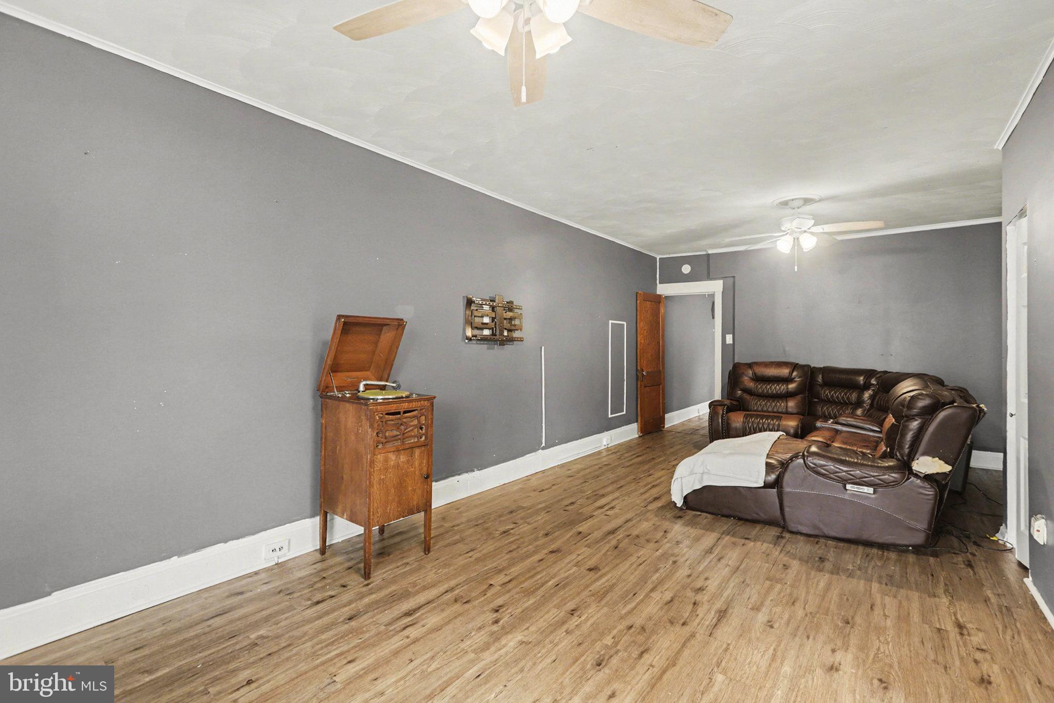 2721 Butler Street Harrisburg, PA 17103 - Photo 4 of 32 Spacious living area with modern charm.