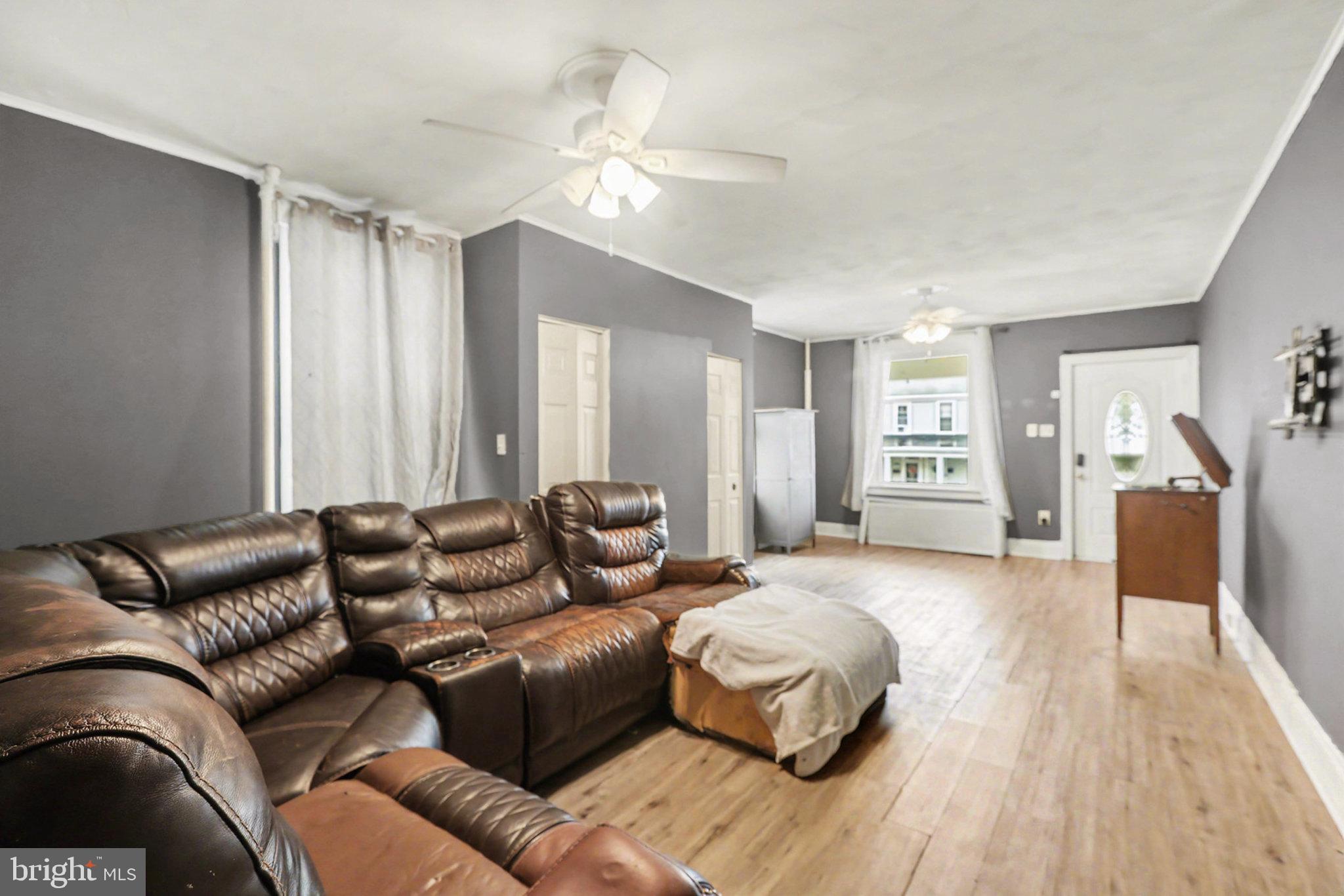 2721 Butler Street Harrisburg, PA 17103 - Photo 6 of 32 Spacious living area with modern charm.