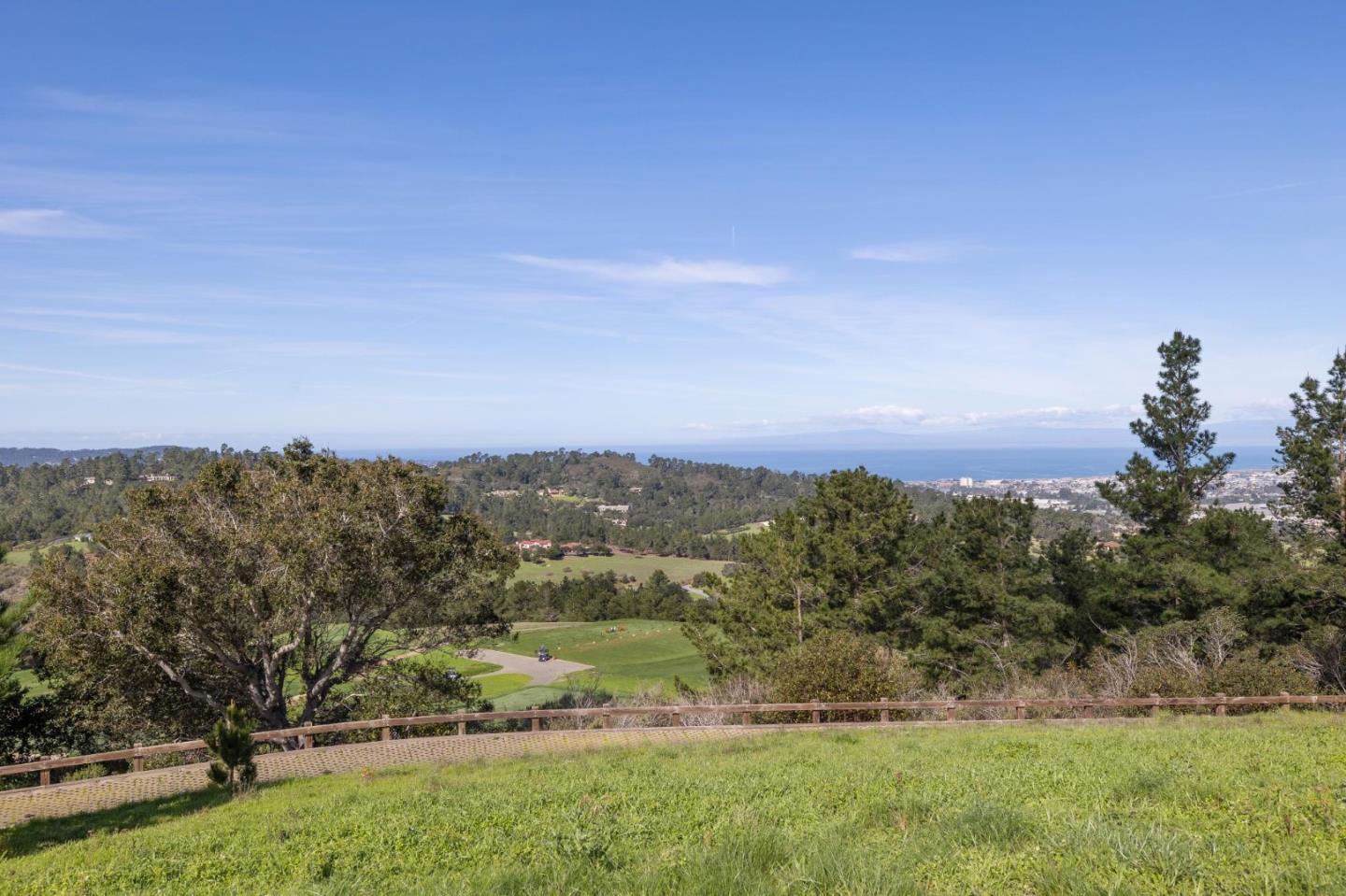 8282 Monterra Ranch Road Monterey, CA 93940 - Photo 30 of 34 a view of a city with lush green forest
