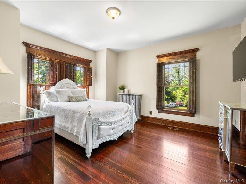 2 Pine Hill Road Chester, NY 10918 - Photo 15 of 31 a bedroom with a bed and a large window