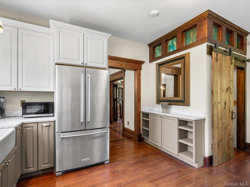 2 Pine Hill Road Chester, NY 10918 - Photo 20 of 31 a kitchen with stainless steel appliances a refrigerator and a stove top oven