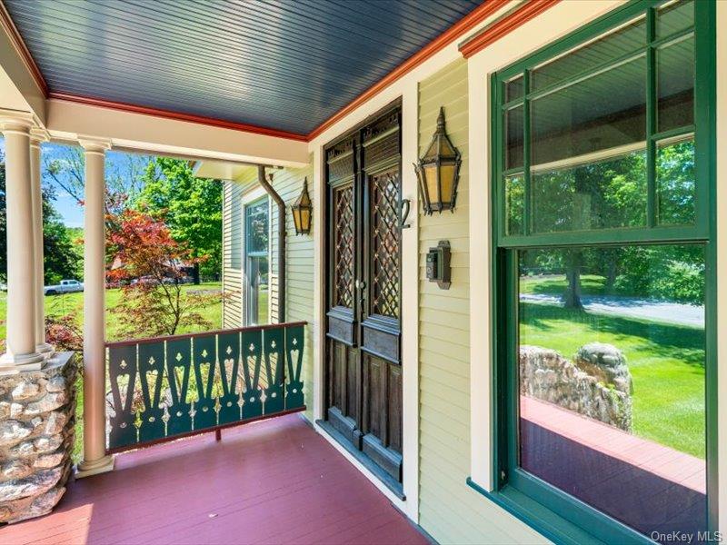 2 Pine Hill Road Chester, NY 10918 - Photo 4 of 31 a view of a porch with wooden floor and outdoor space