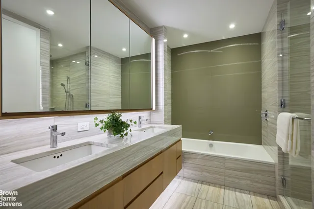 a view of a livingroom with furniture and windows