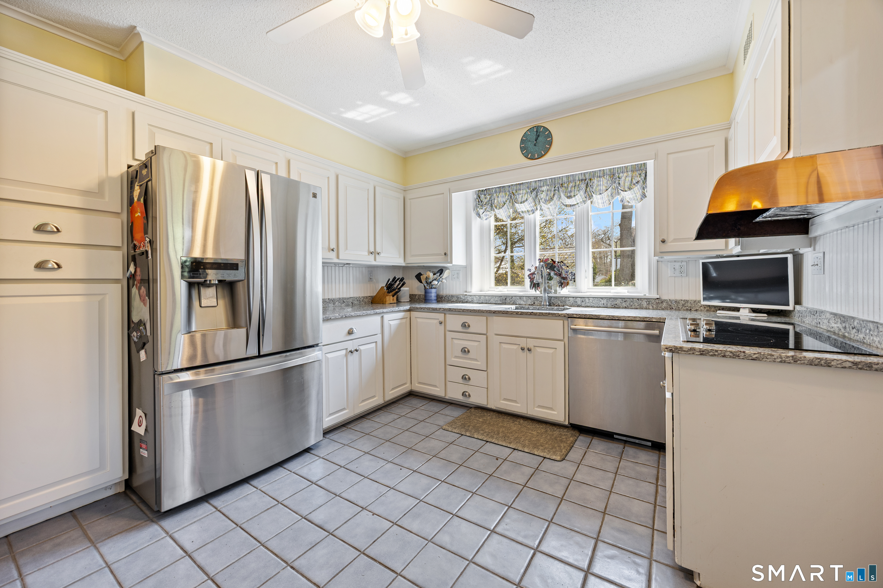 40 10 Acre Road New Britain, CT 06052 - Photo 5 of 38 a kitchen with stainless steel appliances a refrigerator sink and microwave