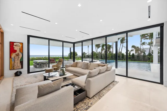 a bedroom with a large bed and a large window