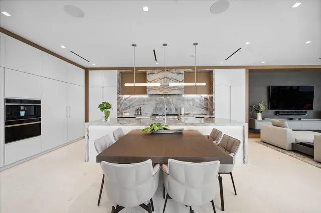 a view of a house with backyard sitting area and garden