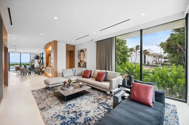 a view of a city street next to a building