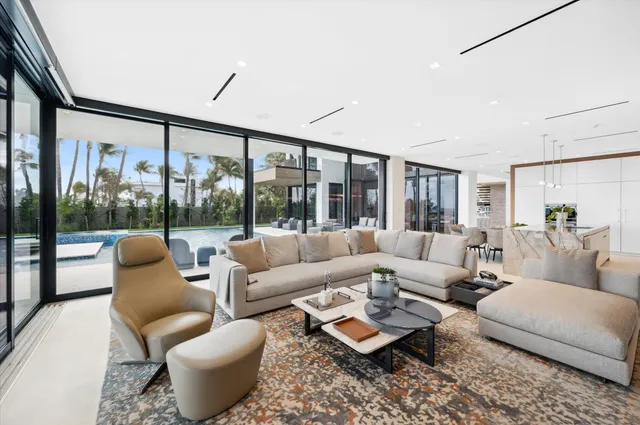 a view of yard with swimming pool and green space