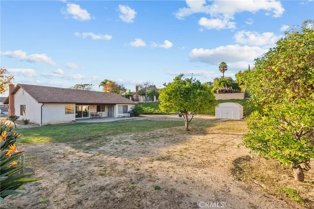 a house view with a garden space