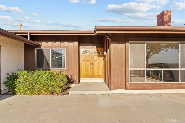 front view of a house with a outdoor space