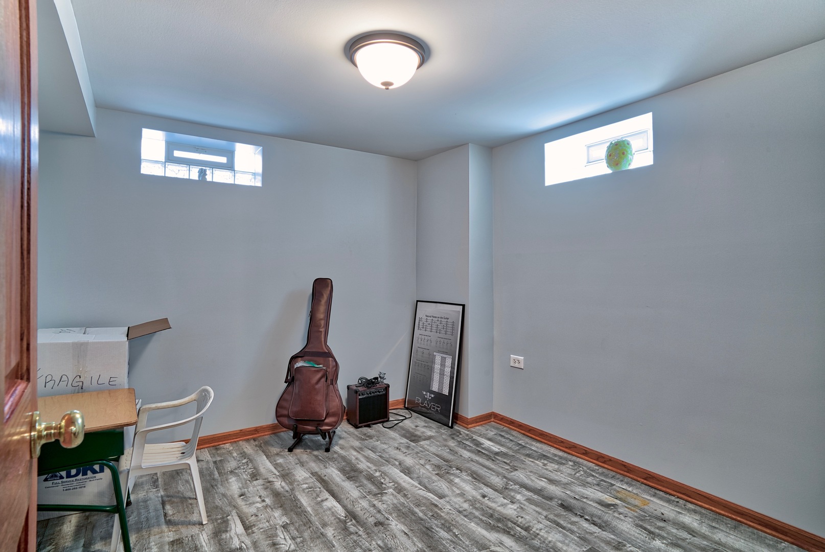 S703 Winfield Road Wheaton, IL 60189 - Photo 11 of 17 a workspace with furniture wooden floor and a window