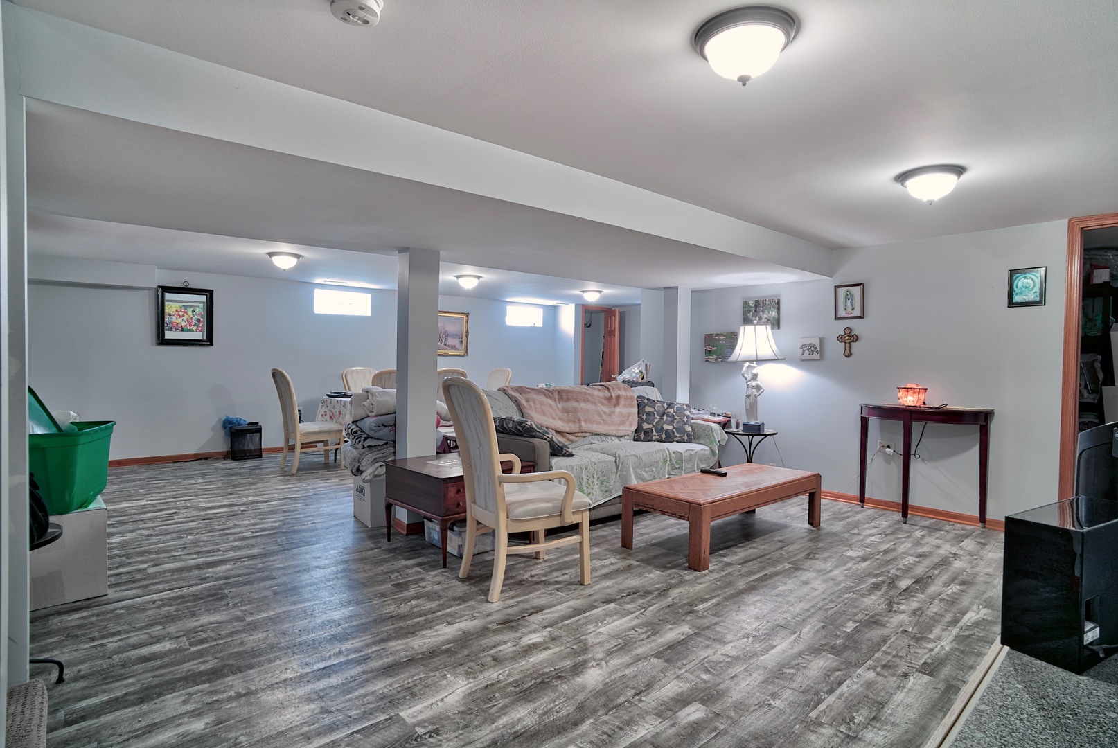 S703 Winfield Road Wheaton, IL 60189 - Photo 12 of 17 a living room with furniture and wooden floor