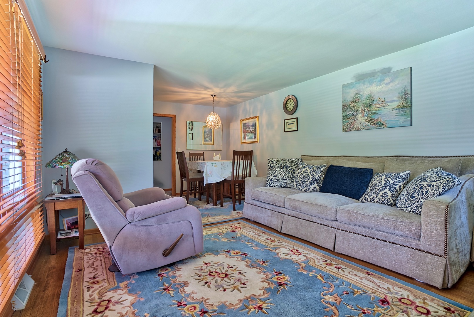 S703 Winfield Road Wheaton, IL 60189 - Photo 5 of 17 a living room with furniture and a couch