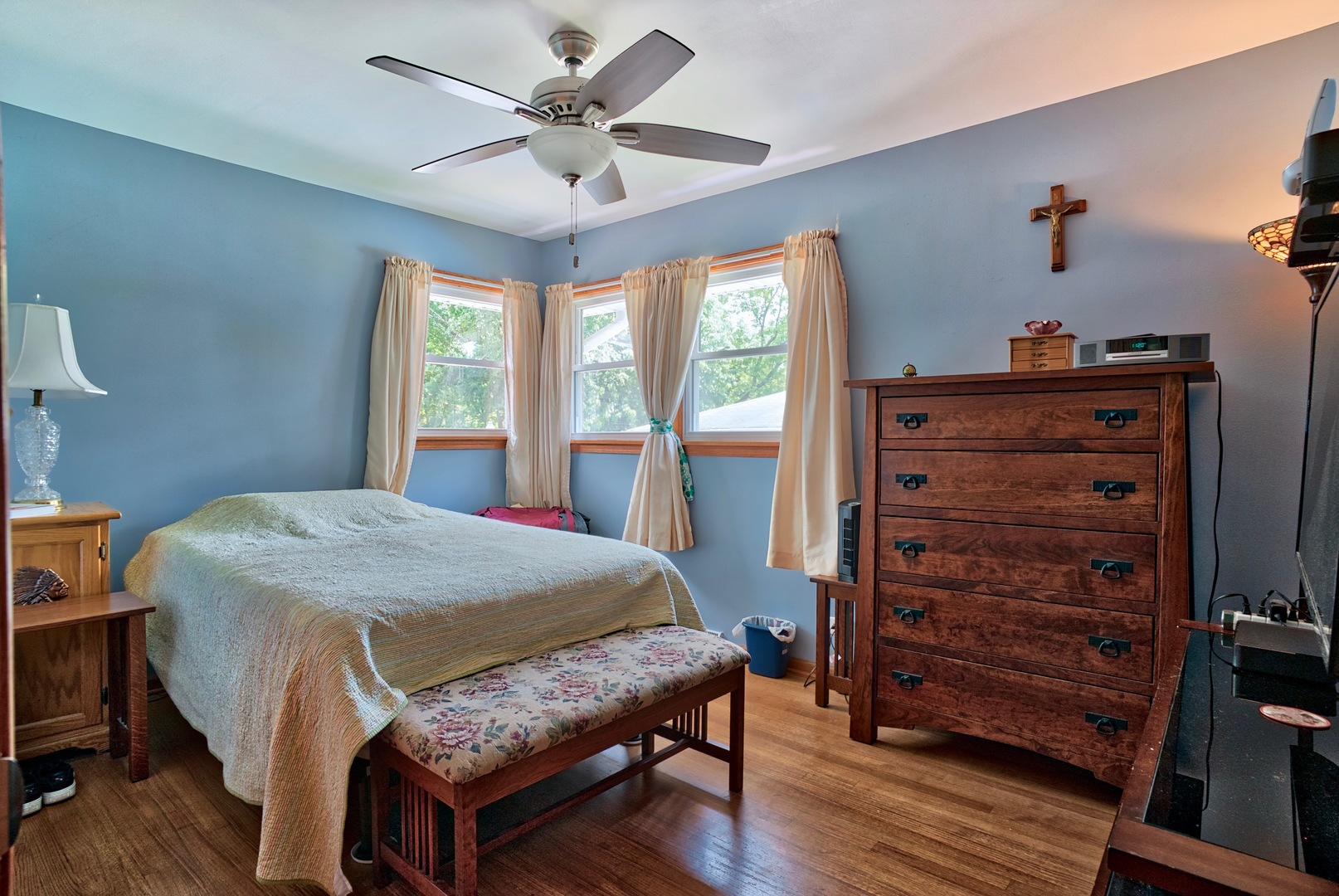 S703 Winfield Road Wheaton, IL 60189 - Photo 8 of 17 a bedroom with a bed and a dresser