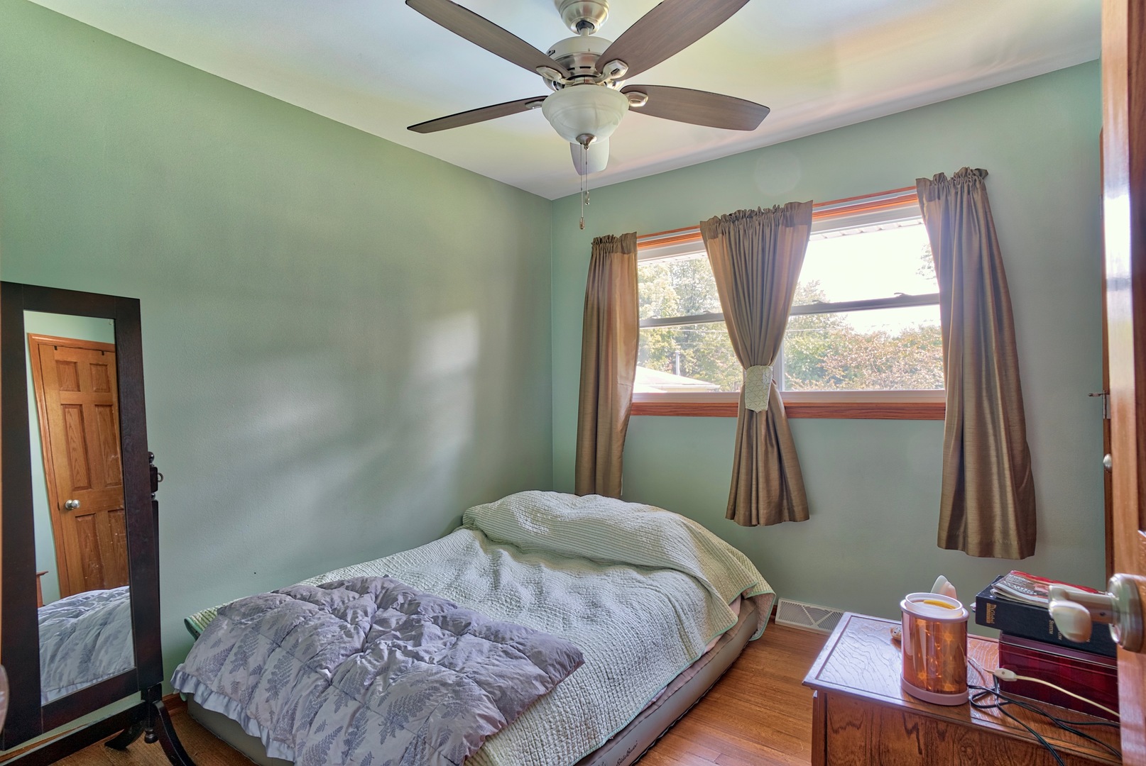 S703 Winfield Road Wheaton, IL 60189 - Photo 9 of 17 a bedroom with a bed and a window