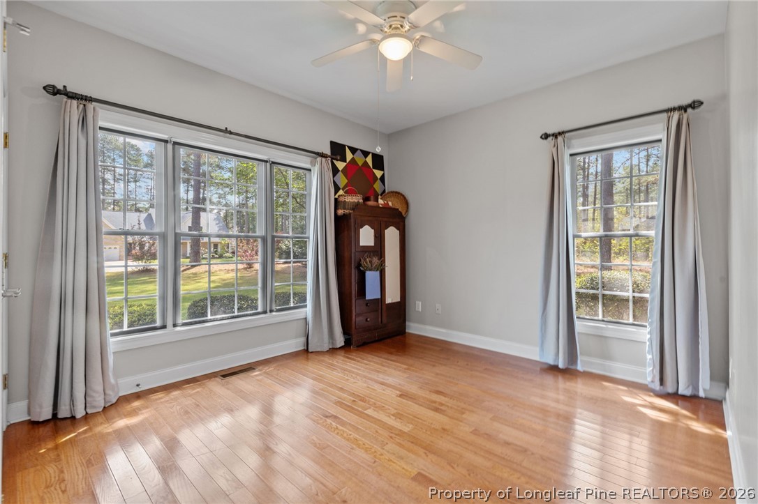 30180 East Lake Road Wagram, NC 28396 - Photo 29 of 42 an empty room with windows and closet