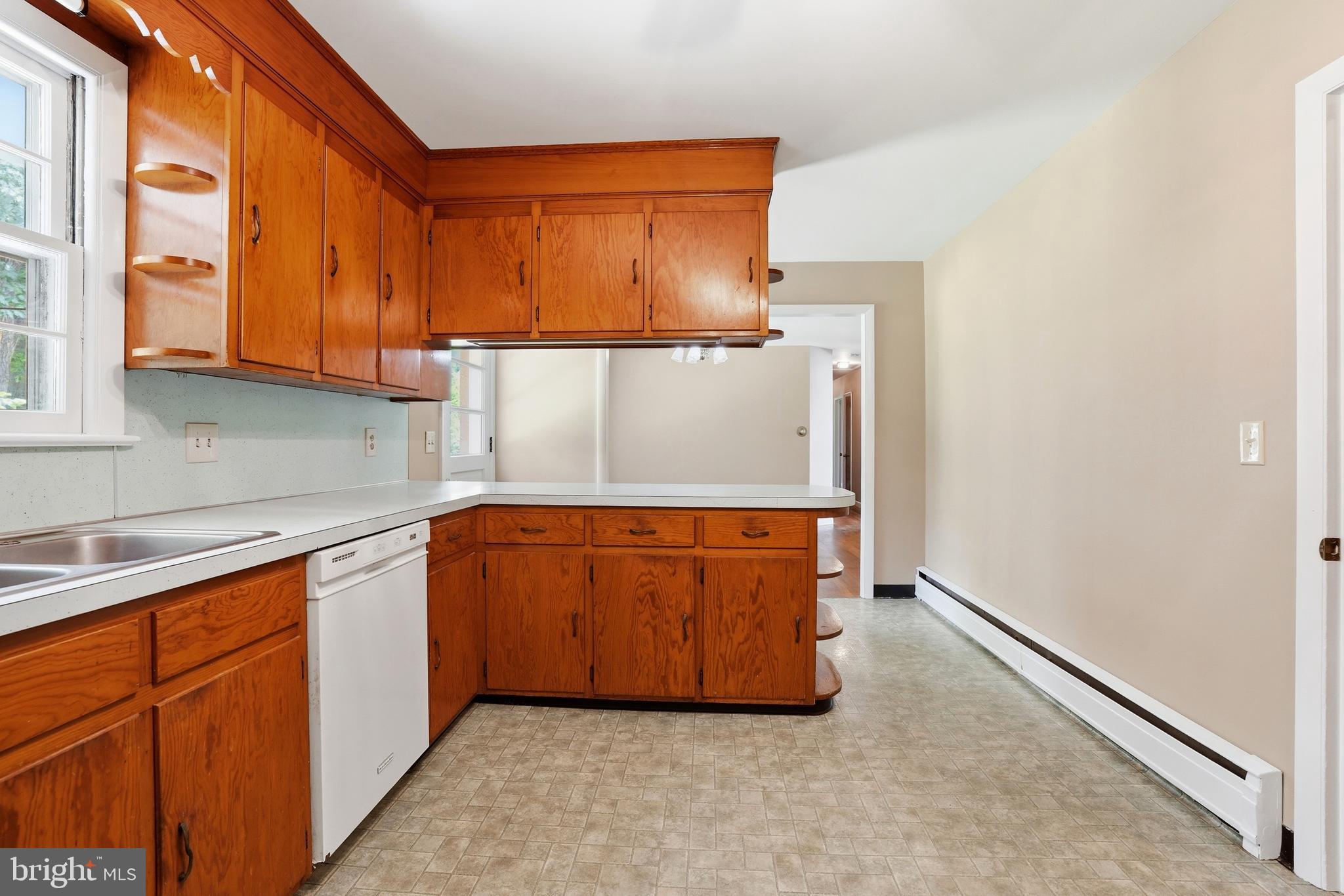 486 Derstine Road Hatfield, PA 19440 - Photo 16 of 53 a kitchen with stainless steel appliances a refrigerator and sink