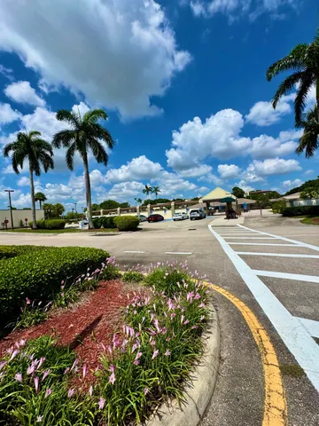 a view of a building and garden
