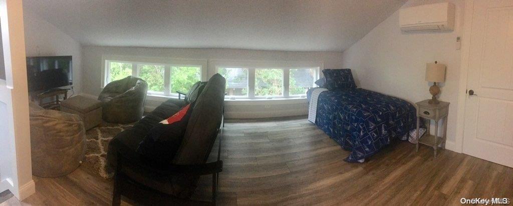 368 Surf Road Ocean Beach, NY 11770 - Photo 6 of 11 a living room with furniture and a large window