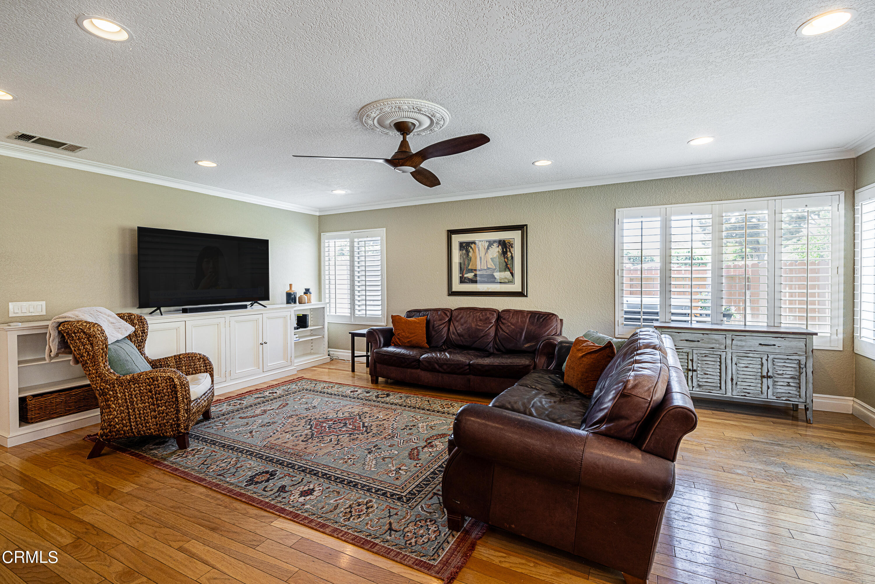 2891 Corte Caballos Camarillo, CA 93010 - Photo 11 of 30 a living room with furniture and a flat screen tv
