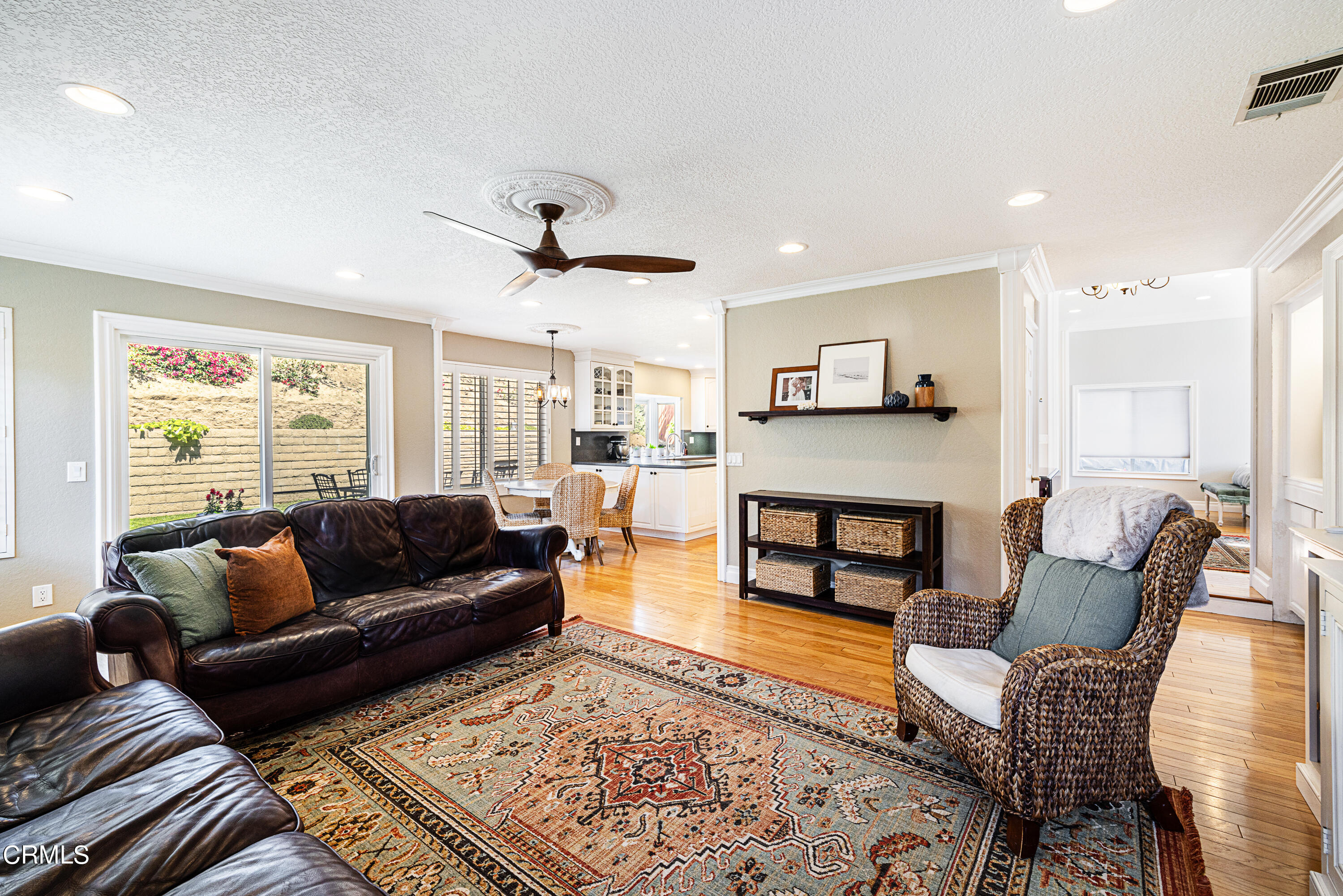 2891 Corte Caballos Camarillo, CA 93010 - Photo 12 of 30 a living room with furniture and a fireplace