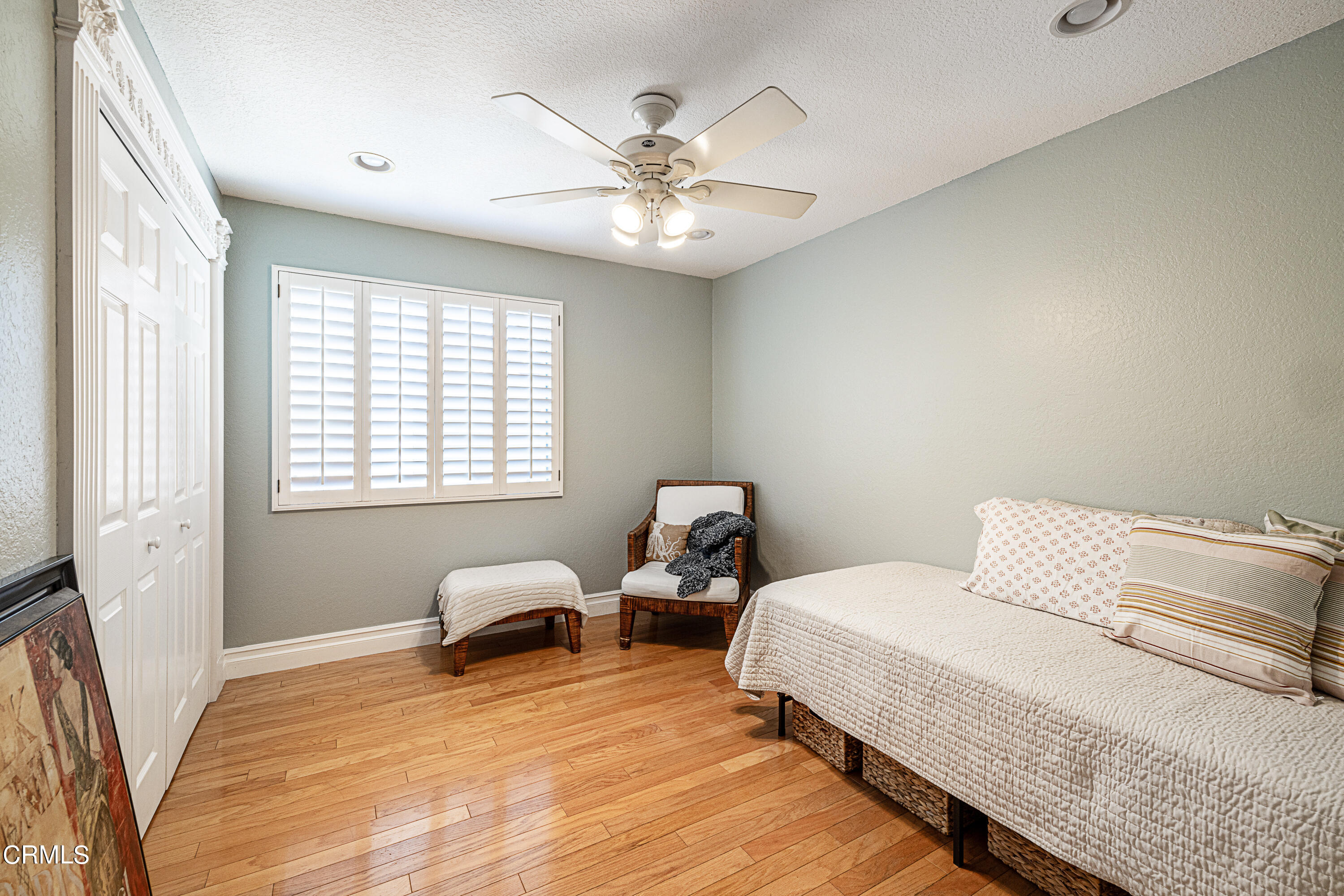 2891 Corte Caballos Camarillo, CA 93010 - Photo 15 of 30 a bedroom with two beds and a chandelier