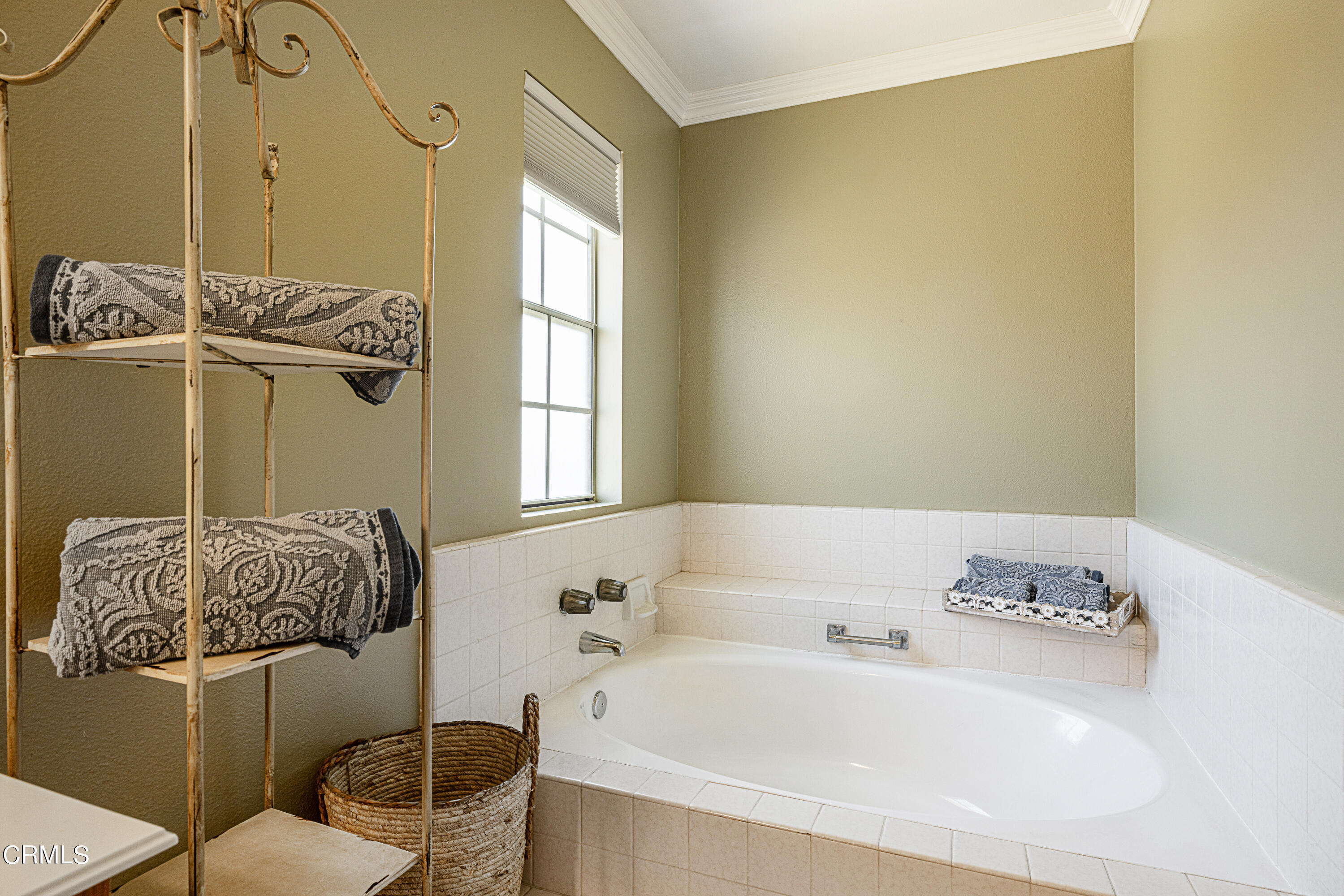 2891 Corte Caballos Camarillo, CA 93010 - Photo 22 of 30 a bathroom with a tub sink and mirror