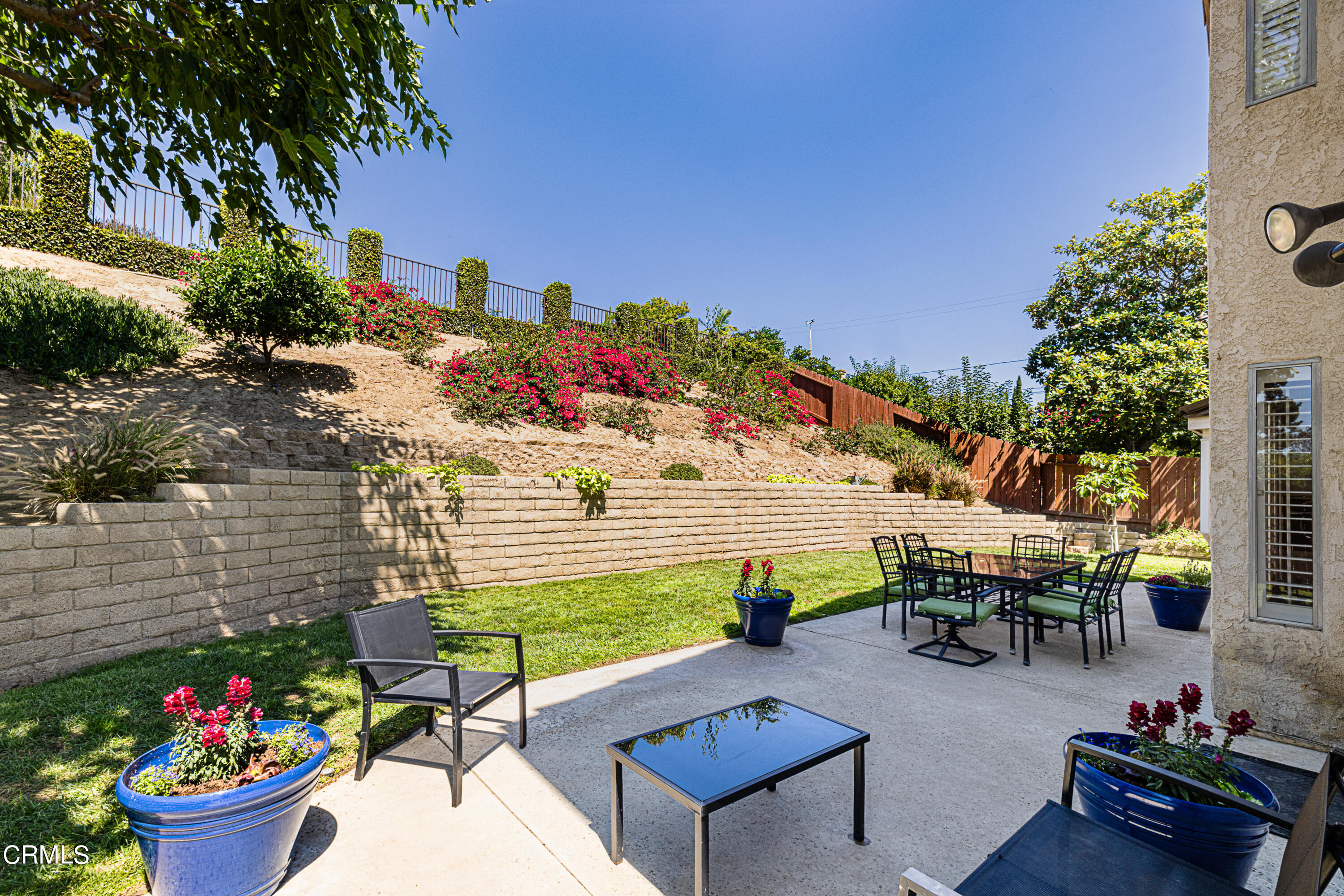 2891 Corte Caballos Camarillo, CA 93010 - Photo 24 of 30 a view of a chairs and table in the patio