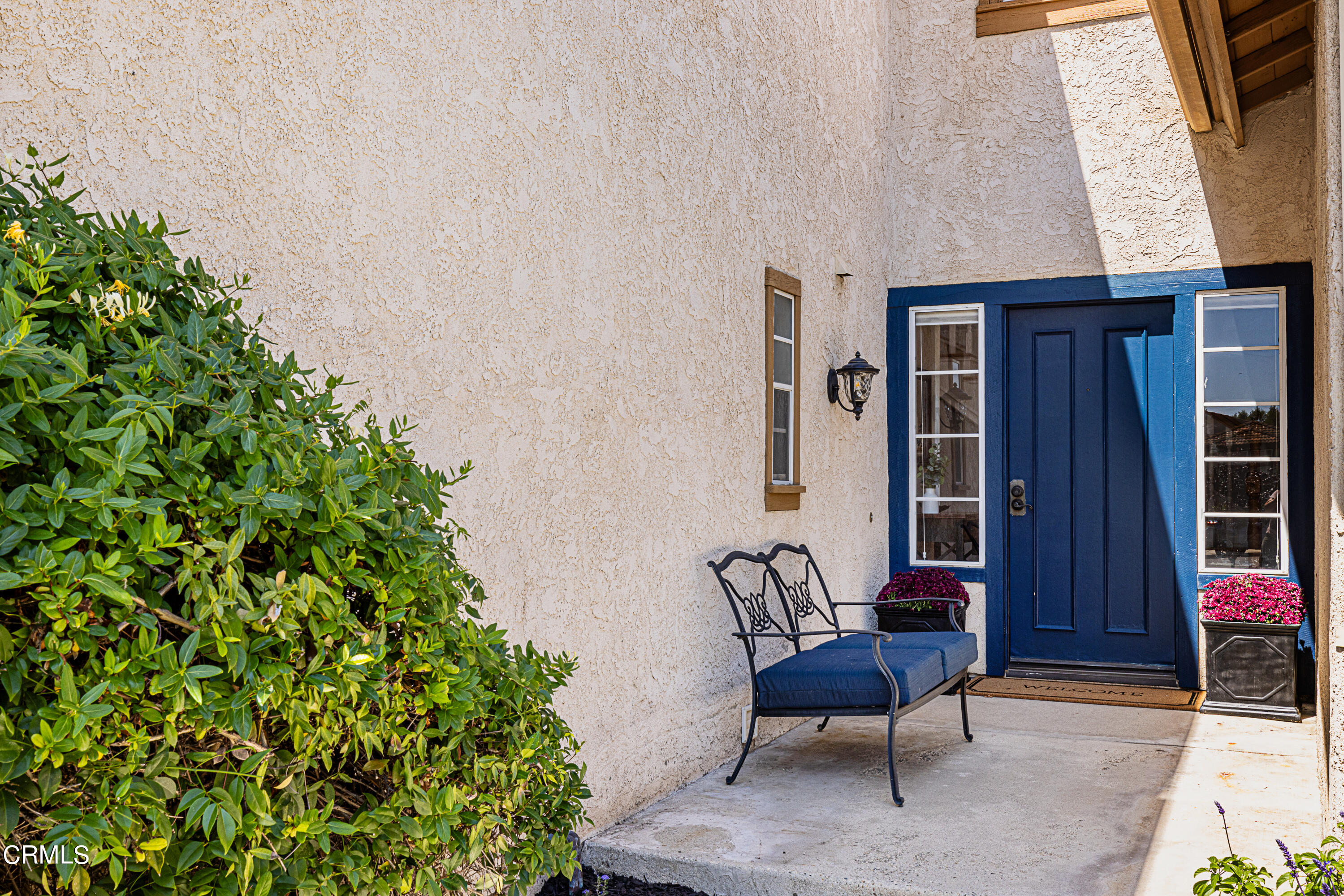 2891 Corte Caballos Camarillo, CA 93010 - Photo 3 of 30 a chair and table in front of a house