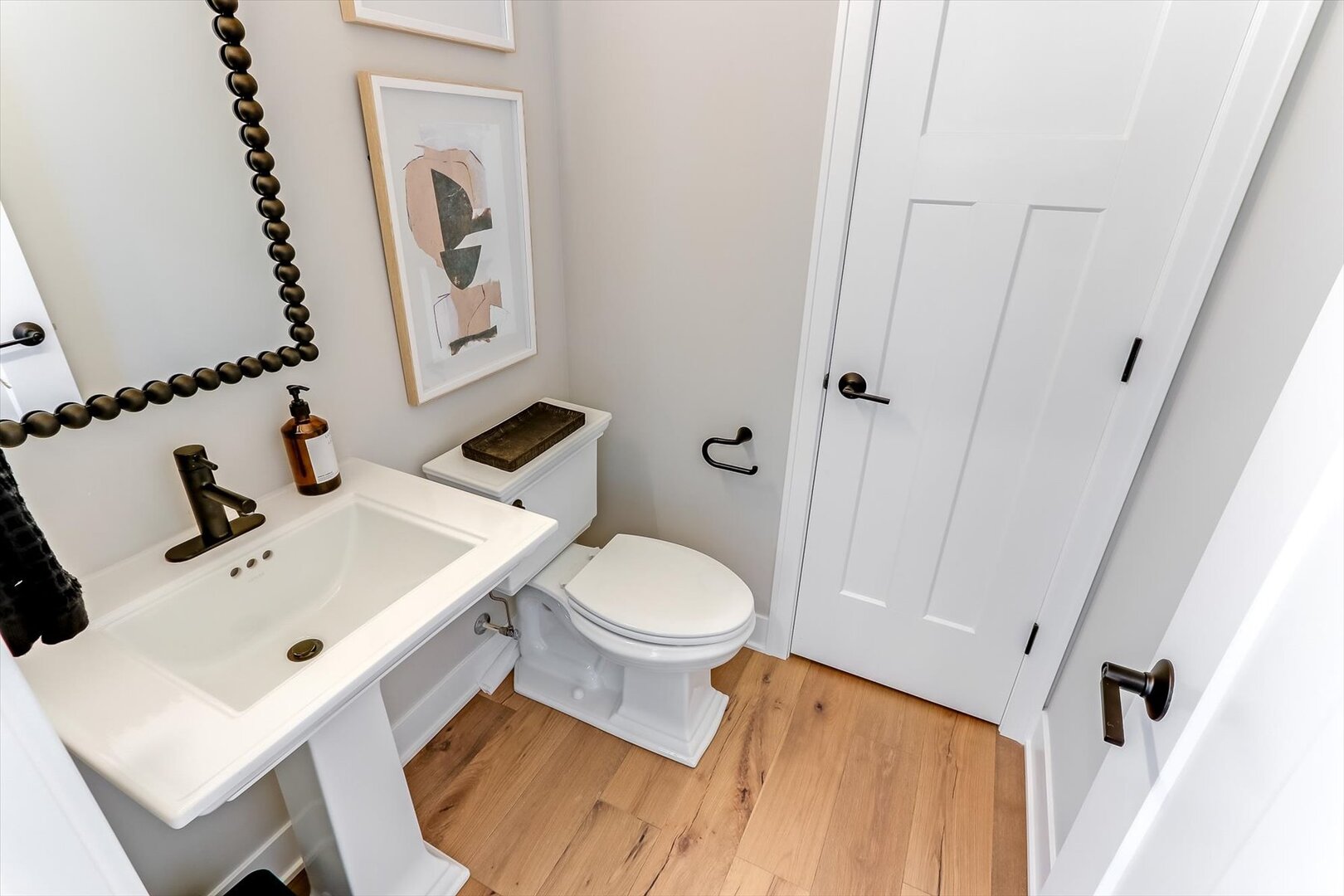 23211 West Teton Lane Plainfield, IL 60585 - Photo 16 of 30 a white toilet sitting next to a bathroom sink