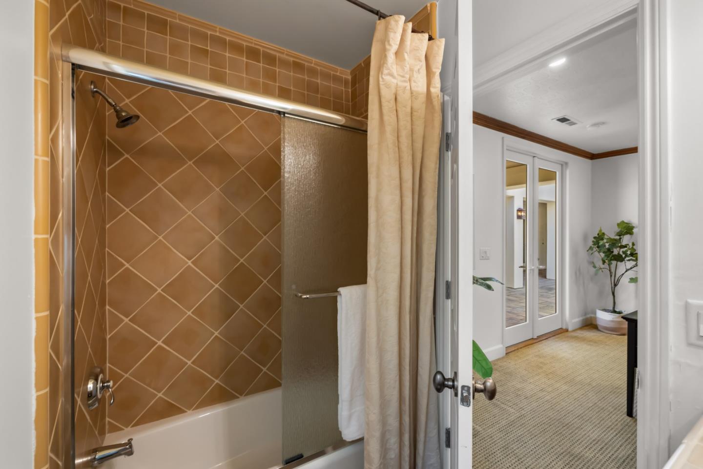 302 Pasadera Drive Monterey, CA 93940 - Photo 25 of 40 a bathroom with a shower and a sink