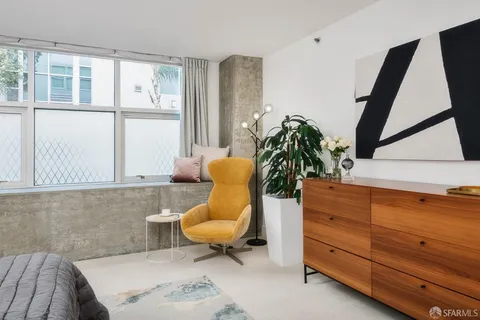 a view of a living room with a rug