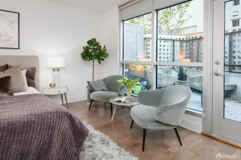 a view of a building with a tree