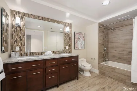 a view of a chair and table in the patio