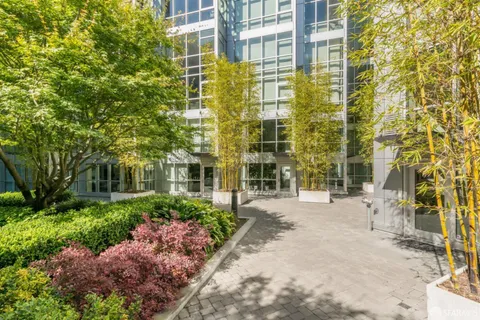 a view of a swimming pool and a yard