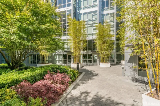 a view of a swimming pool and a yard