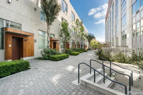 a street sign on a pole on a street