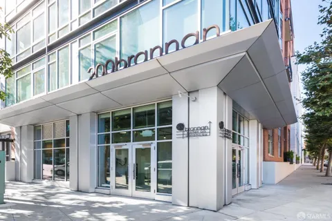 a bathroom with a shower and a bath tub