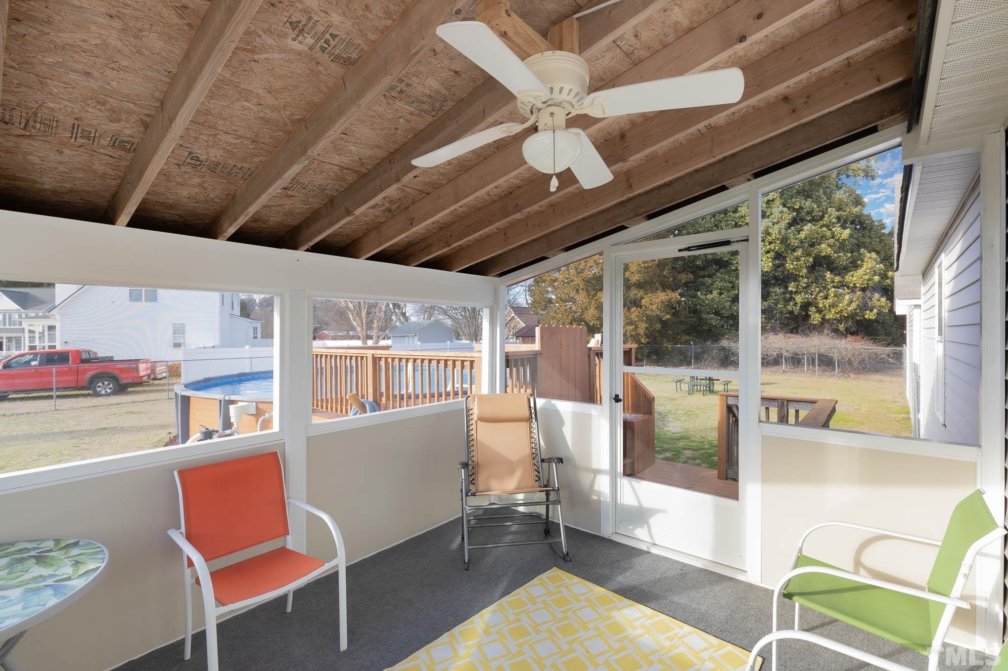 50 Wagner Road Willow Spring, NC 27592 - Photo 15 of 18 a room with furniture or wooden floor and a large window