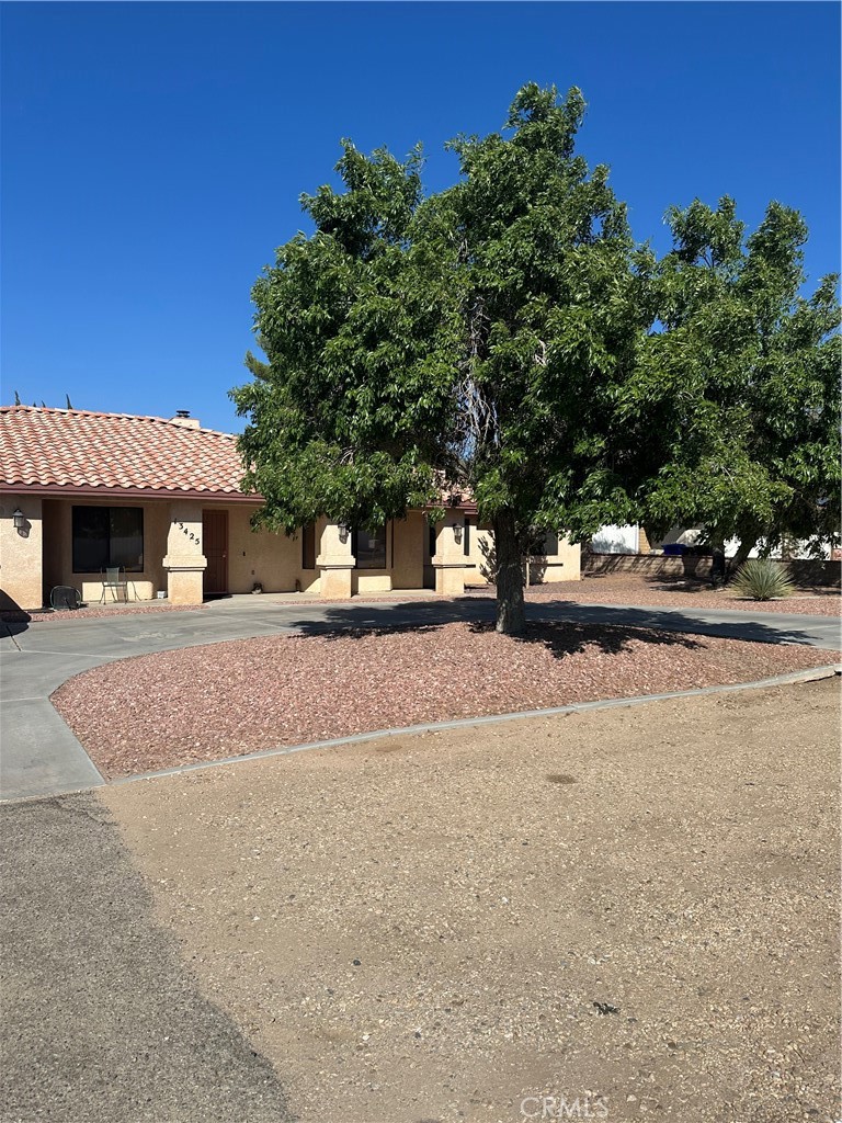 a view of a house with a street