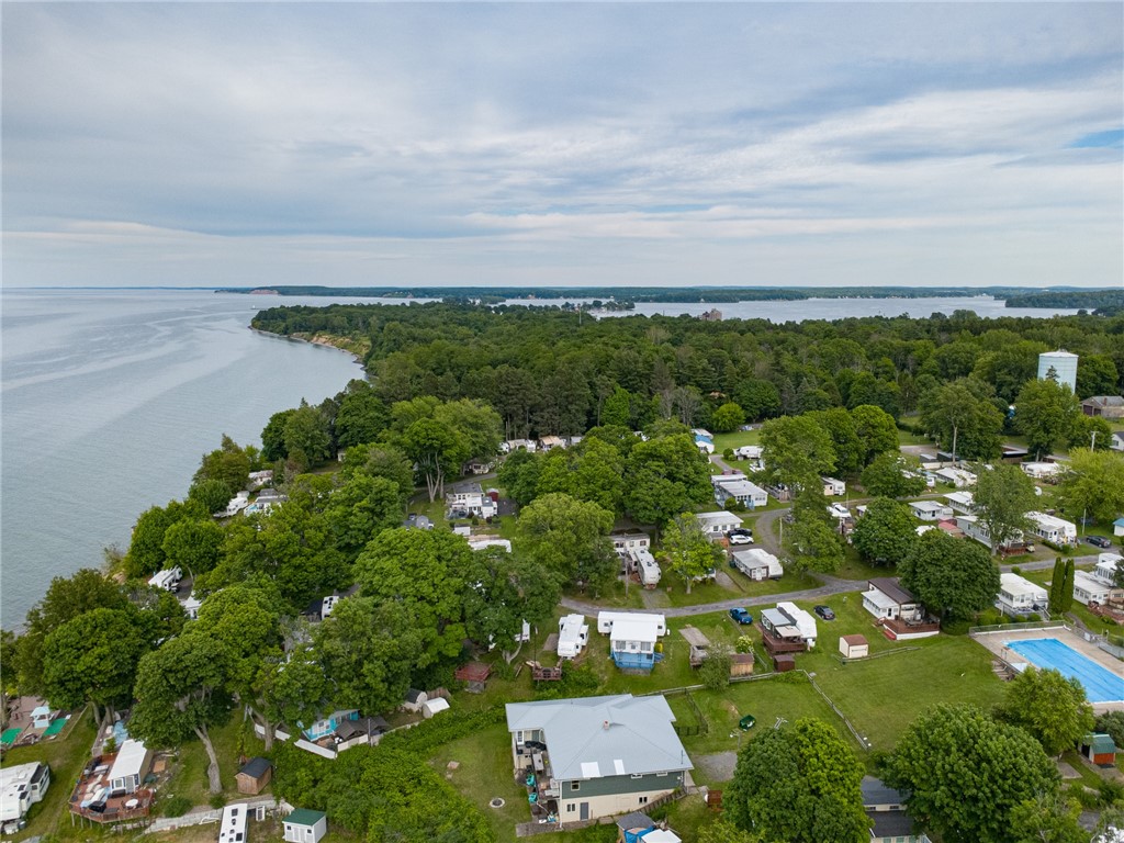 7945 Lake Road, Unit 44 Sodus, NY 14555 - Photo 21 of 22 THERE ARE TRAILS DOWN TO THE BEACH FRONT - ENJOY A