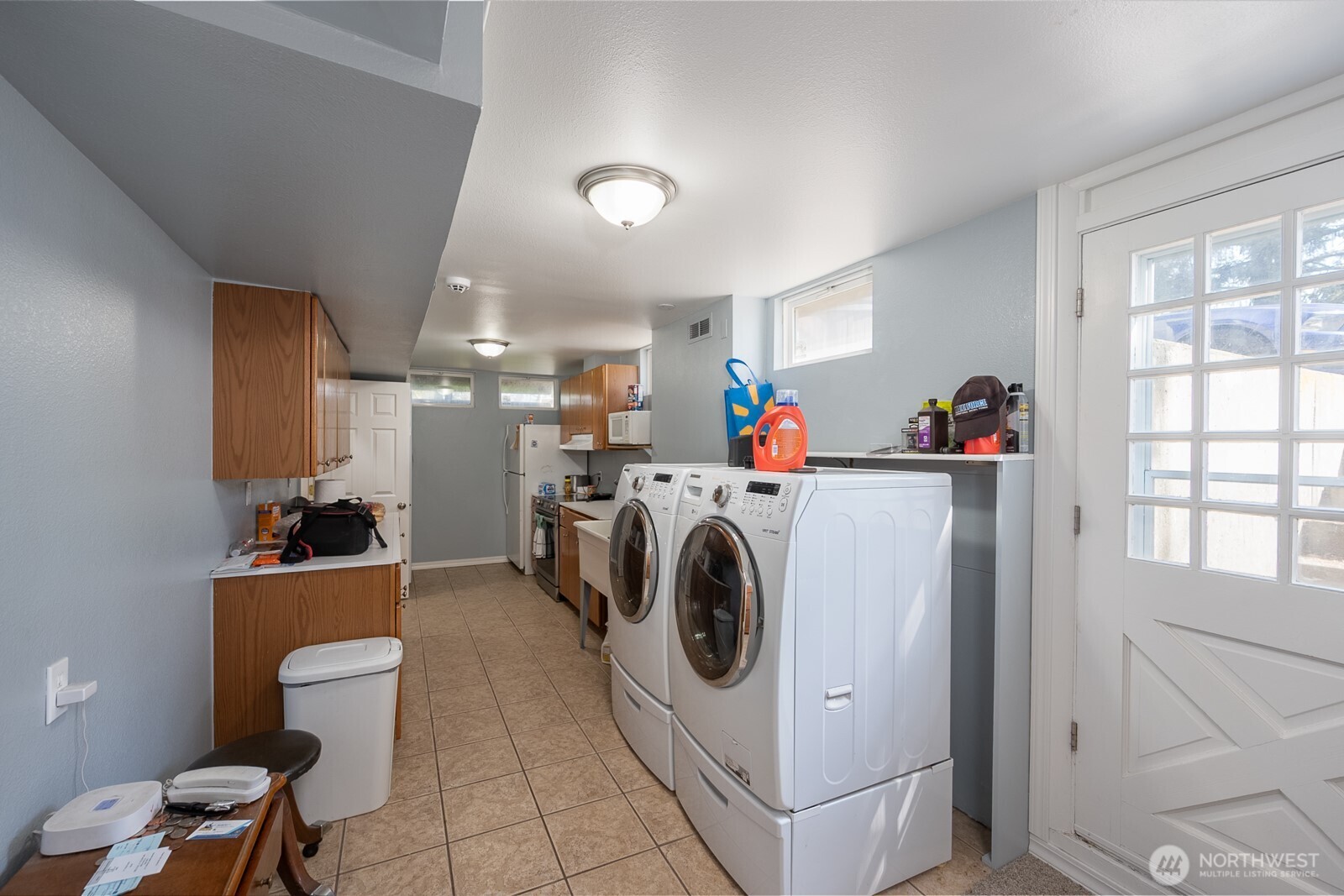 11627 Rd K Northeast Moses Lake, WA 98837 - Photo 25 of 37 a view of a storage & utility room with two washing machine