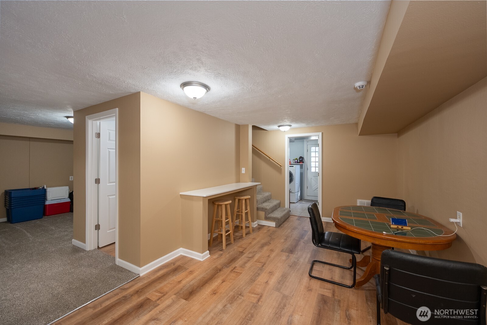 11627 Rd K Northeast Moses Lake, WA 98837 - Photo 30 of 37 a workspace with furniture and wooden floor