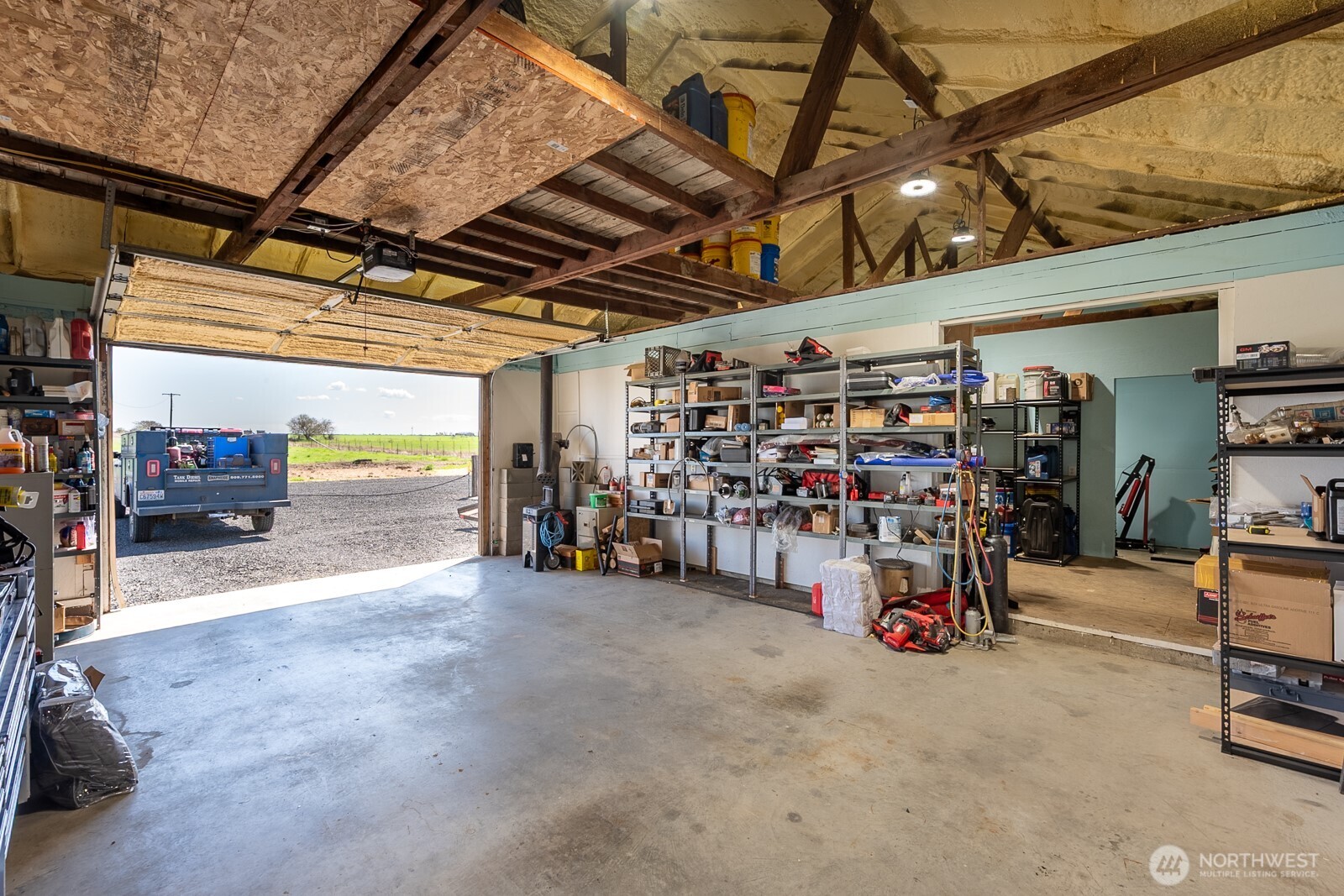 11627 Rd K Northeast Moses Lake, WA 98837 - Photo 31 of 37 a view of a garage with storage