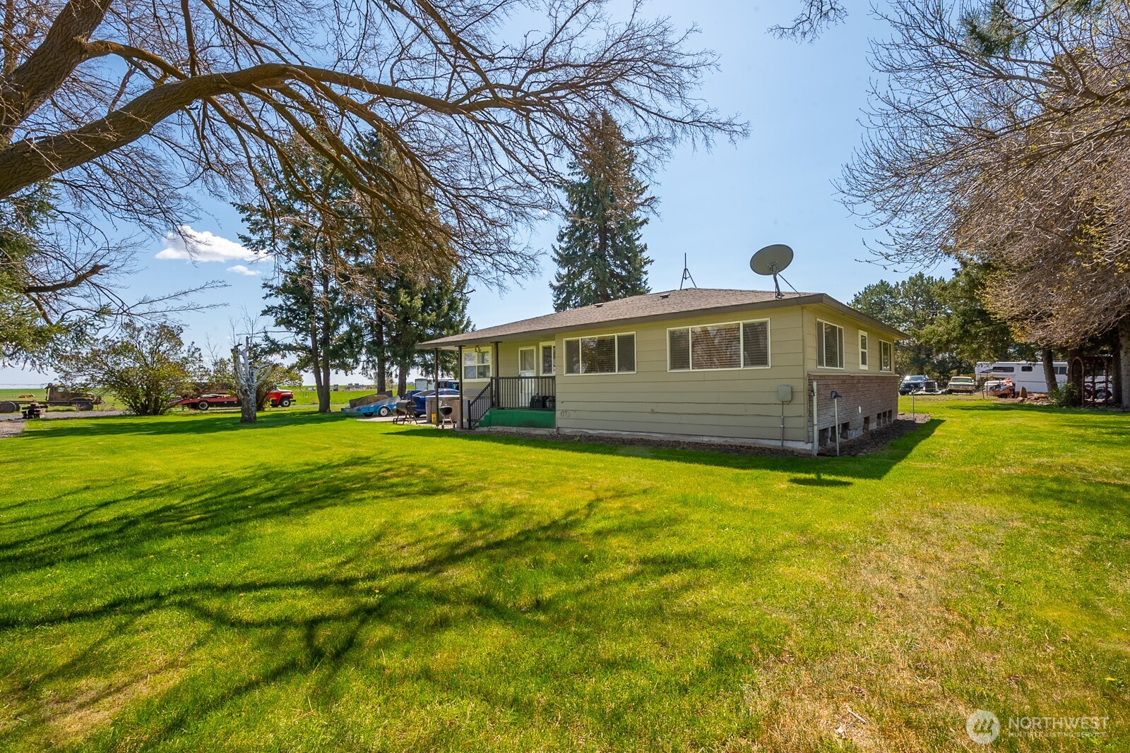11627 Rd K Northeast Moses Lake, WA 98837 - Photo 7 of 37 a front view of house with yard and green space