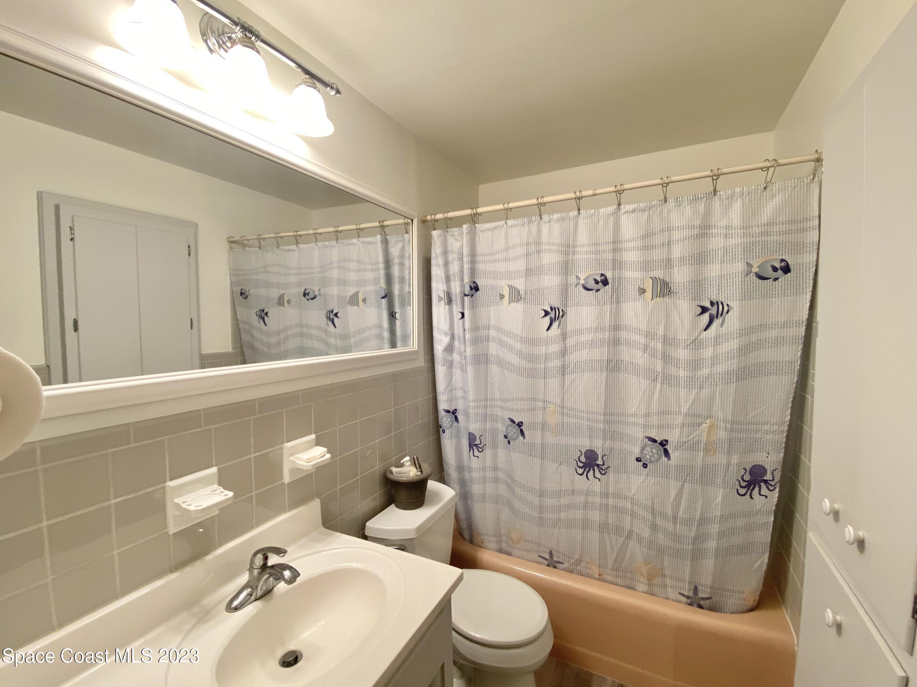 110 Deleon Road Cocoa Beach, FL 32931 - Photo 25 of 26 Guest Bathroom