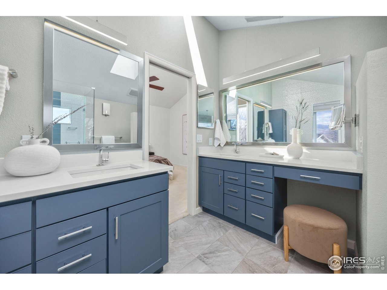 6644 Drew Ranch Lane Boulder, CO 80301 - Photo 19 of 45 a bathroom with a granite countertop sink mirror and double