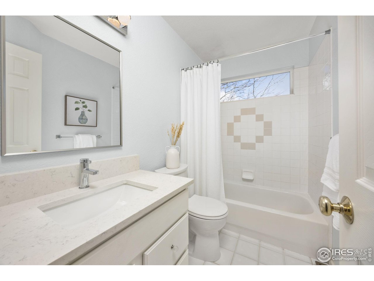 6644 Drew Ranch Lane Boulder, CO 80301 - Photo 23 of 45 a bathroom with a sink a toilet and shower